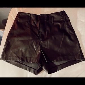 Black leather shorts
